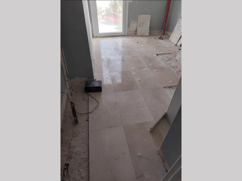 New floor tiles in a bedroom