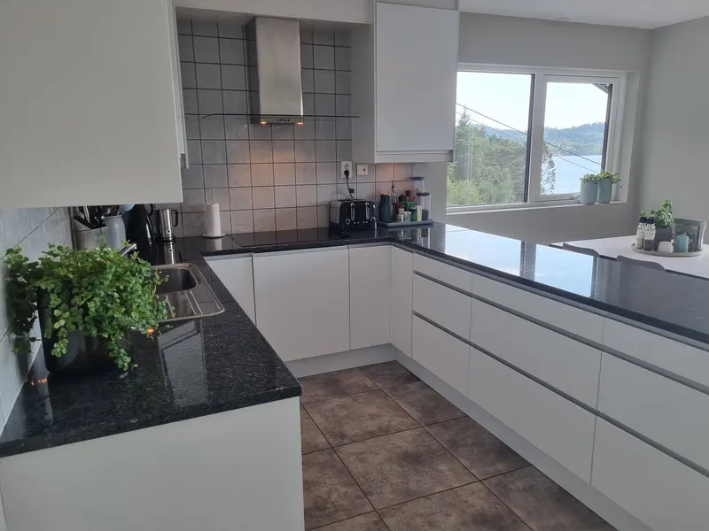 Granite worktop and fjord view from the sink