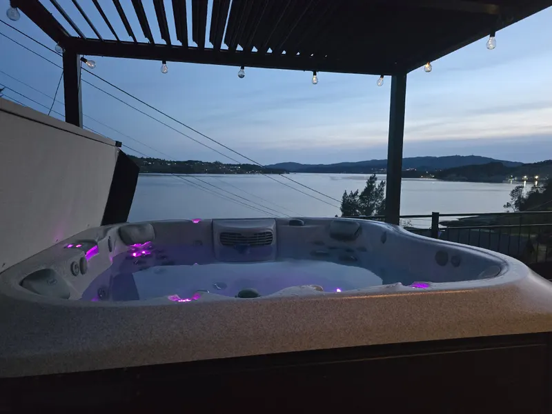 Hot tub for 6–8 people at dusk
