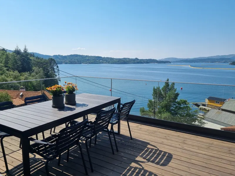 Outdoor dining with a view of the fjord