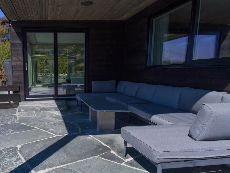 Covered lounge outside the lower living room